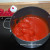 Empty tomatoes into another large pot and blitz smooth with a hand blender