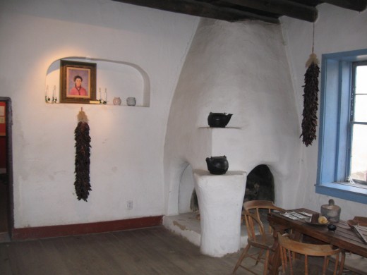 Dining area in Kit Carson's home in Taos, NM - furnishing a home in the past was simpler.