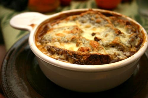 organic French onion soup with rye bread and Swiss cheese, toasted