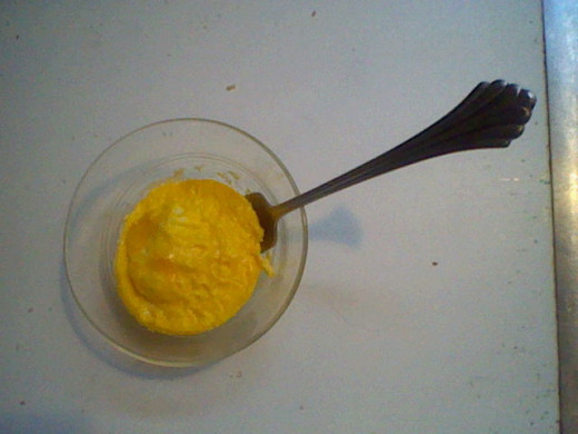 Use the fork around the edges to remove the egg. You may have to do go around a few times to totally remove the egg.