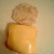 Place the cheese on top of the ham and egg.