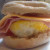 Place the top of the muffin onto the ham and cheese. Let stand a few moments. And while you do clean any excess egg off of the bowl.
