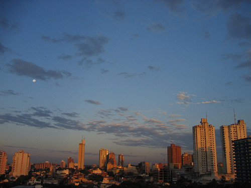 Asunción at sunset.  Picture taken by Alex-S and licensed under Creative Commons Attribution License Version 2.0.