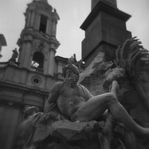 Piazza Navona in the snow - detail of the Fountain of the Four Rivers and the river-god Ganges