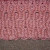 The end of the pink scarf (close-up) without fringe. The end of the pink scarf (close-up) without fringe.