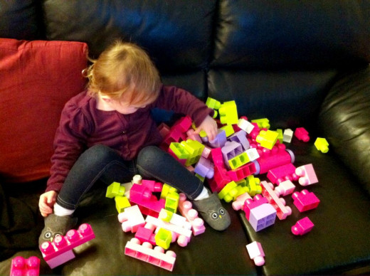 My daughter playing with her First Builders Mega Bloks for girls.