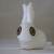 This little rabbit fits in the palm of my hand. My MIL had one and every time I visited her I would pick it up and rub it -- the porcelain is silky soft. She eventually bought me one. Ain't he sweet?