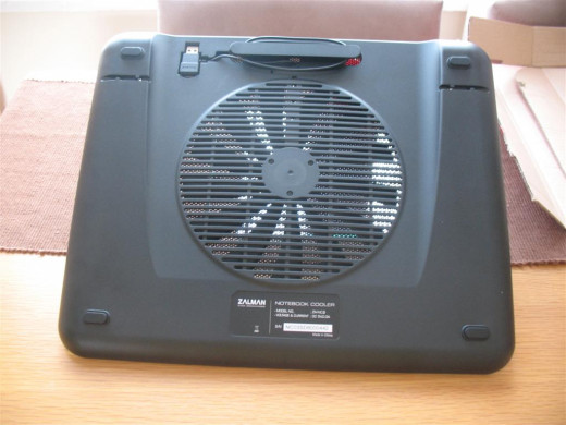 Underneath of the Zalman ZM-NC3 laptop cooler. It comfortably fits on a desk or your lap.