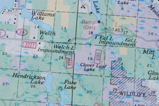 In this case, it tells us we are near the corner of sections 14 and 13 and sections 23 and 24, or very near Welch Lake.