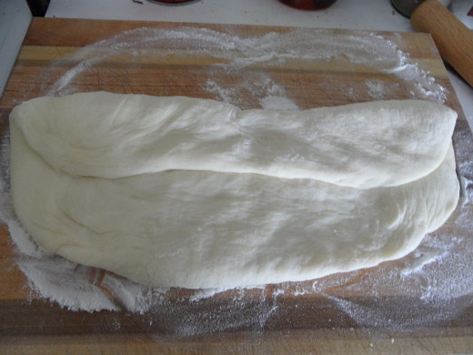 Folding the rolled out dough in thirds