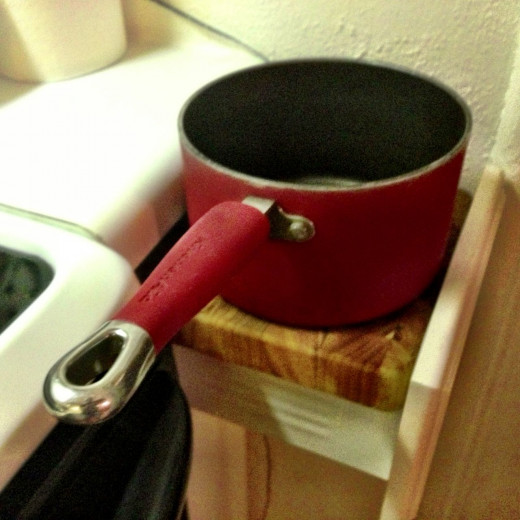 I can't put a hot pan on the countertop but I can put it here.