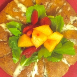 Cheese and garlic loaf with fruity salad.