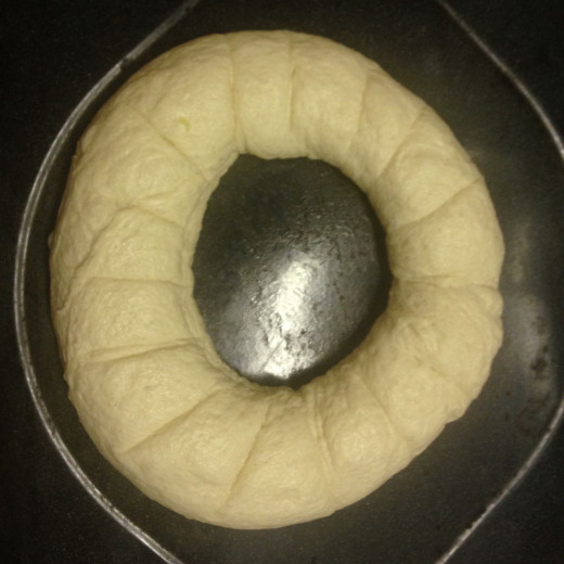 Form the dough into a ring on a baking tray