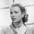 This shows the typical Kelly style with understated pearl necklace and earrings. This shows the typical Kelly style with understated pearl necklace and earrings.