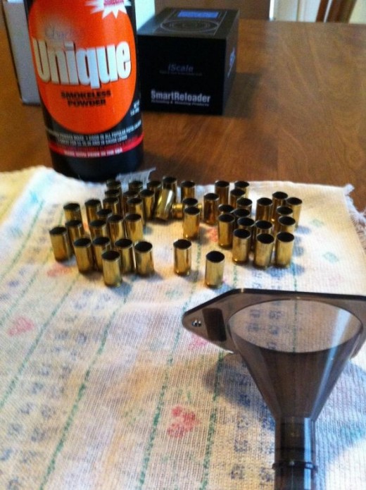 brass, powder and funnel