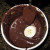 Coat Each Banana Piece in Chocolate by Immersing in Melted Chocolate Coat Each Banana Piece in Chocolate by Immersing in Melted Chocolate