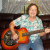 Me with My Fender Resonator guitar. I really like to bring this guitar to class as it is really loud enough for everyone to hear. This is fun.