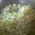 Adding the veggies to the broth.