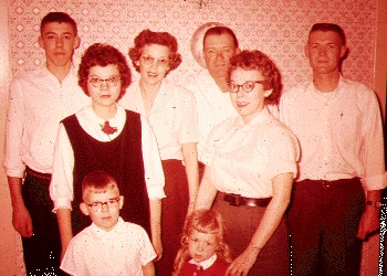 My wife with her parents and five siblings, early on.