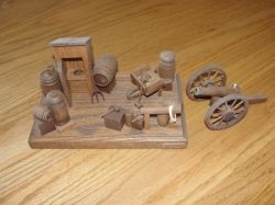 Outhouse and Cannon wood art