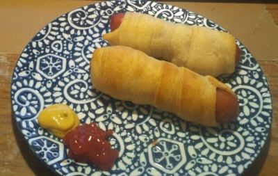 Veggie dogs wrapped in cresent rolls.  Pop in the oven dinner in minutes.