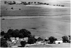 Barn is lower center of this late 1940 photo of the farm