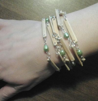 Wrap it over your wrist multiple times for a loose, loopy bracelet.