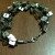 Here's the 4-strand black-lip shell bracelet I converted for my mom.
