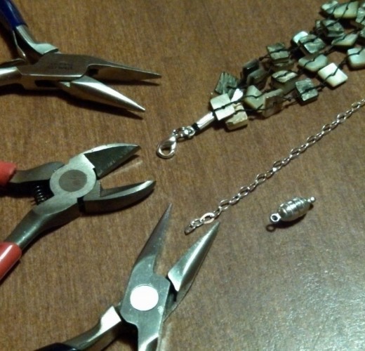 Tools you'll need - chain nose pliers, cutter, unfinished chain, magnetic clasp, and 2 split rings.