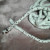 Stitch beads onto the ends of the i-cord. Stitch beads onto the ends of the i-cord.