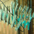 Hang clothes hangers in an open doorway until sticks dry. You can get a lot of sticks painted in a short period of time with this hands free method. Hang clothes hangers in an open doorway until sticks dry. You can get a lot of sticks painted in a short period of time with this hands free method.