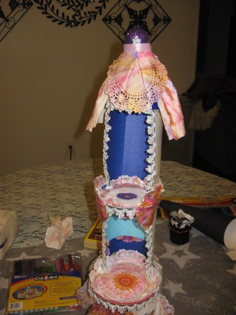Glue the painted doily to the roof front. I have not coffee painted over this one yet.
