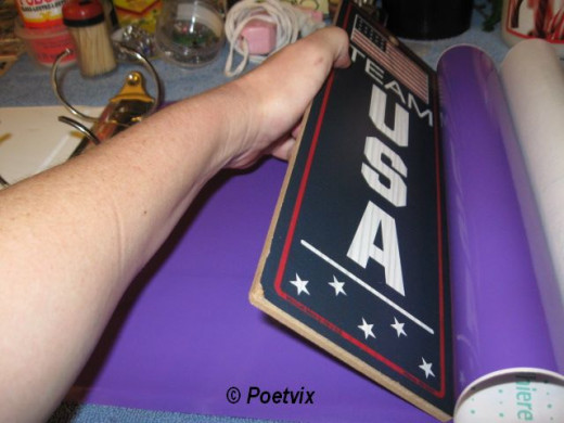 The wide roll tape is great for covering larger surfaces, like this. But, the larger the surface, the more chances of wrinkles, bubbles and general boo boos. Use a straight edge to smooth as you pull the back lining off the tape. It makes everything 