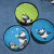 Decorate the cans with stickers. Consider taking some stickers over onto the cardboard to tie it all together. Decorate the cans with stickers. Consider taking some stickers over onto the cardboard to tie it all together.