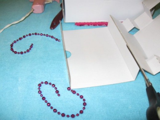 Do any cutting needed to make the tray and on the smaller box. We will use it to make an interior compartment. Tape it shut as needed. Do any cutting needed to make the tray and on the smaller box. We will use it to make an interior compartment. Tape it shut as needed.