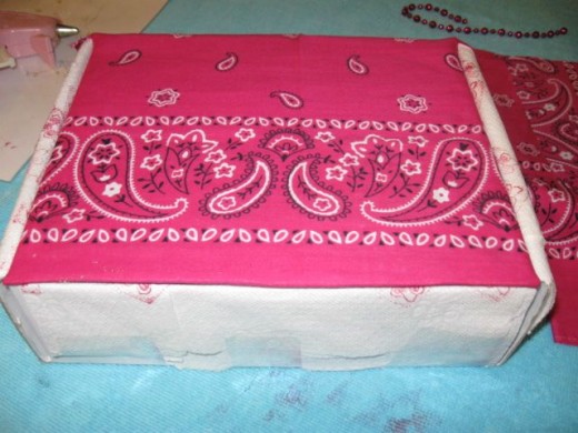 Line it up on the lid the way you like and glue it down. Line it up on the lid the way you like and glue it down.