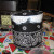 I found turning the can over and making a platform of the bulldog clips made it easier to work. Use liberal coats of Mod Podge on the front and back of the doilies. I found turning the can over and making a platform of the bulldog clips made it easier to work. Use liberal coats of Mod Podge on the front and back of the doilies.