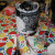 I added a solid doily to the outside. Cover the entire bag, every square inch save the bottom in Mod Podge, repeatedly. I added a solid doily to the outside. Cover the entire bag, every square inch save the bottom in Mod Podge, repeatedly.