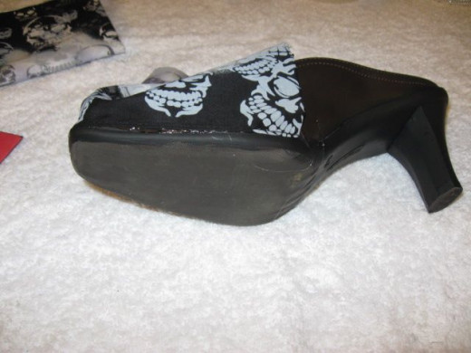 Repeat the process for each side. Fold over at the top and glue inside the shoe.