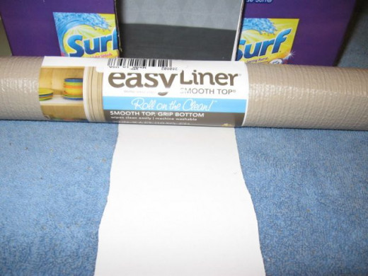 Cover the castle with shelf liner. Do the box part first and then the lid.
