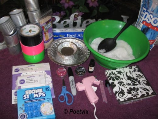 Get all needed items assembled. The basic materials include clean, dry cans for the pots, pie tins and doilies for the flowers, crafting sticks or Popsicle sticks for the stems, and Epsom salts for the dirt. Tin foil, Duct tape and a Sharpie will als