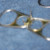 Put the "U" shaped wire over the top of the two tabs you want to connect. Twist it together tightly in the back. Put the "U" shaped wire over the top of the two tabs you want to connect. Twist it together tightly in the back.