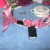 To make the ruffles, first pull up the ribbon in the middle parts to where you have roughly the same amount of ribbon on each end of the choker. To form the ruffle, just bunch it up every inch or so, pinch in the middle and glue down. Rubber cement w To make the ruffles, first pull up the ribbon in the middle parts to where you have roughly the same amount of ribbon on each end of the choker. To form the ruffle, just bunch it up every inch or so, pinch in the middle and glue down. Rubber cement w