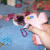 Glue a string of beads onto the back of the pendant forming a loop that hangs down below the bottom of the duct tape pendant. Glue a string of beads onto the back of the pendant forming a loop that hangs down below the bottom of the duct tape pendant.