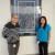 Eldrick Chang and Say Xiong in front of the story quilt. Eldrick Chang and Say Xiong in front of the story quilt.