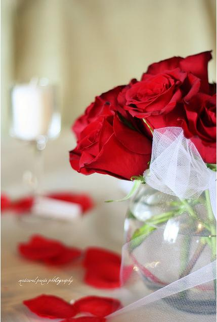 Red roses are a classic decoration or gift for Valentine's day - and as you can see, roses make a fab centrepiece too.