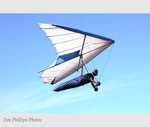Doesn't have to be quite as extreme as hang gliding, but getting the adrenalin pumping helps your mood. Perhaps you could go on a rollercoaster, or try to overcome a fear?