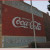 Coca-Cola sign on the side of a building.