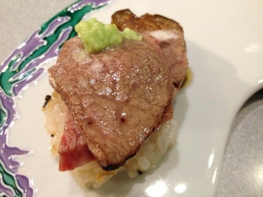 Very tender melt in your mouth Miyazaki Beef, Wasabi Shoyu Sauce, Sushi Rice.