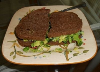 A delicious vegan sandwich on dark rye is easy to make